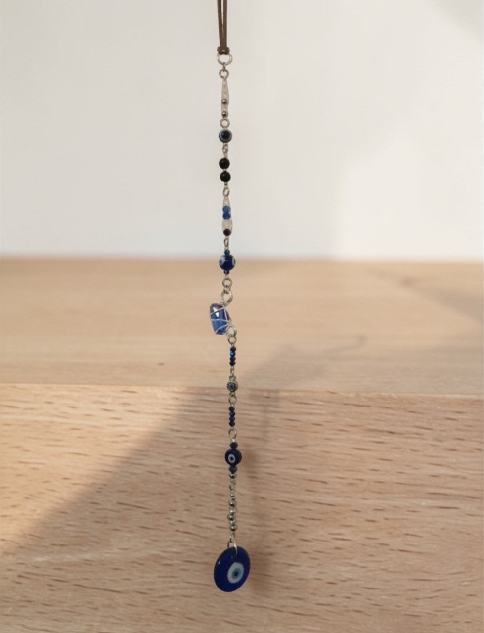 Image 1: Evil eye suncatcher with cobalt blue glass beads – handmade boho window hanging