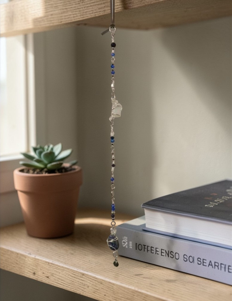 Image 7: Sodalite suncatcher wall hanging – boho meditation space blue crystal decor